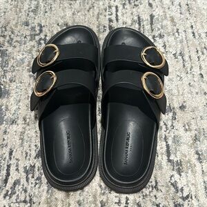 Super cute and trendy Banana Republic molded slides with gold buckle